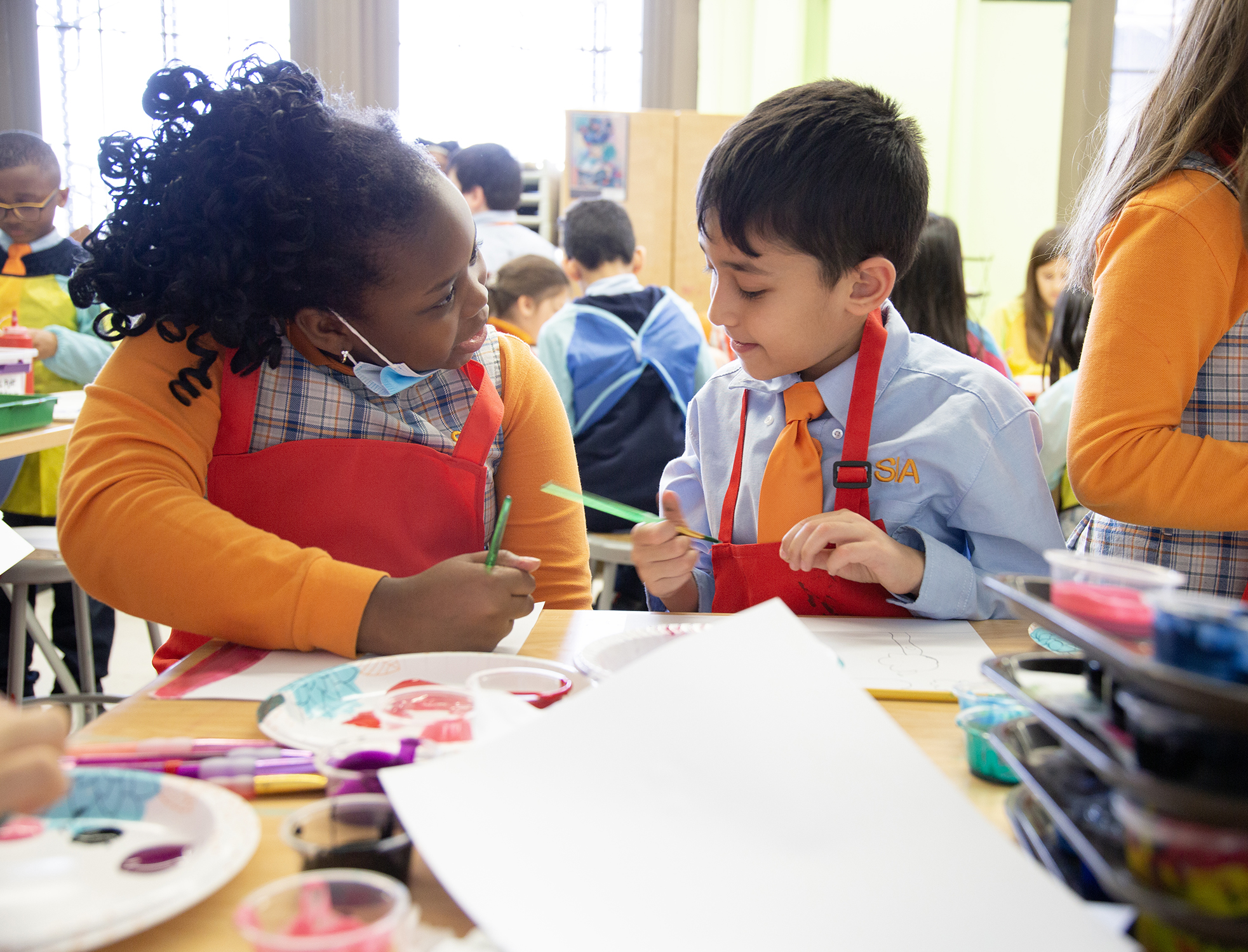 two scholars turn to talk about what they are creating in art