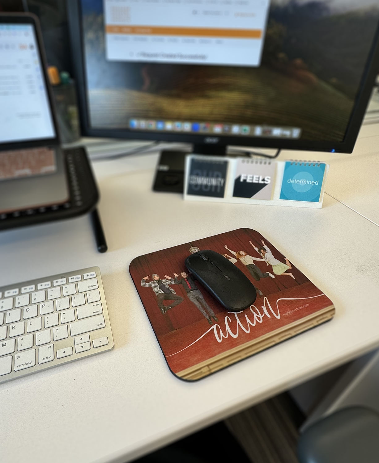 ops team picture with action written in script font under computer mouse
